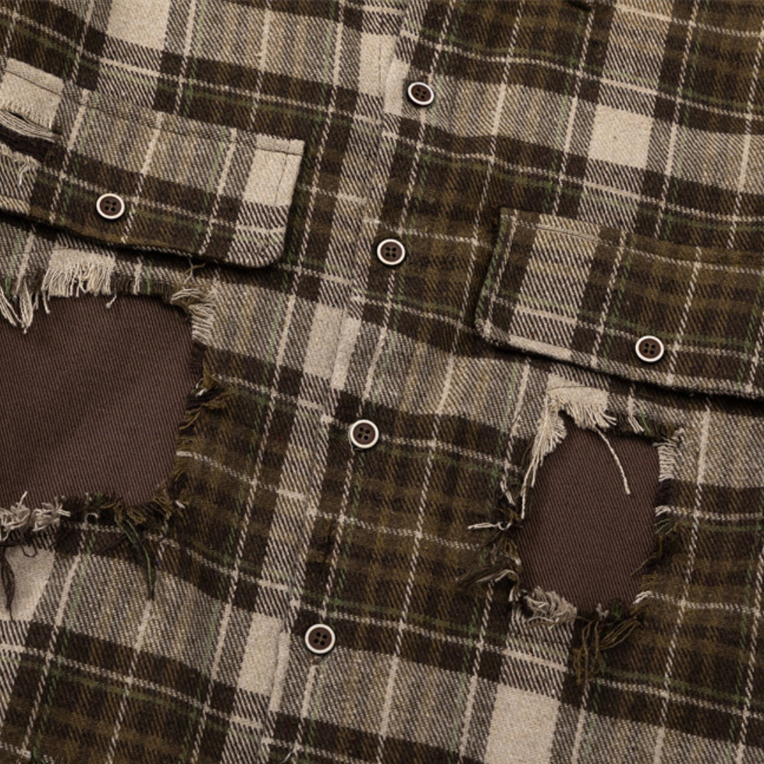 patched up plaid shirt